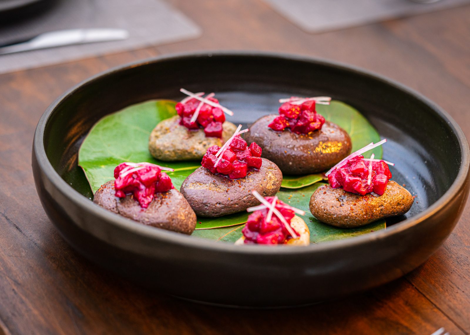 Beetroot tartare on river stones