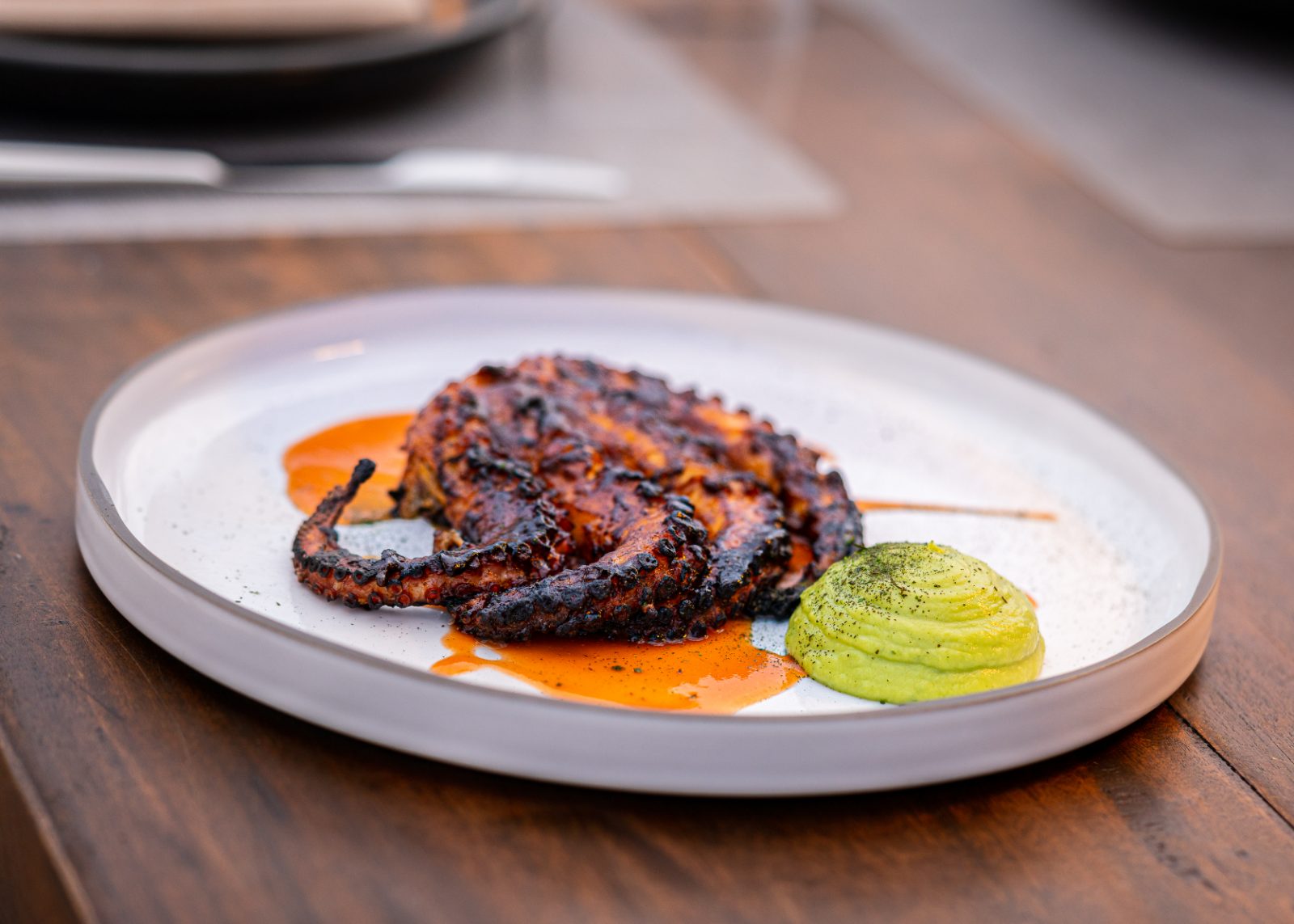 Charred octopus with avocado purée